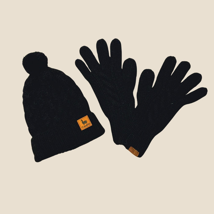 Black beanie and gloves set with a brand logo on a beige background