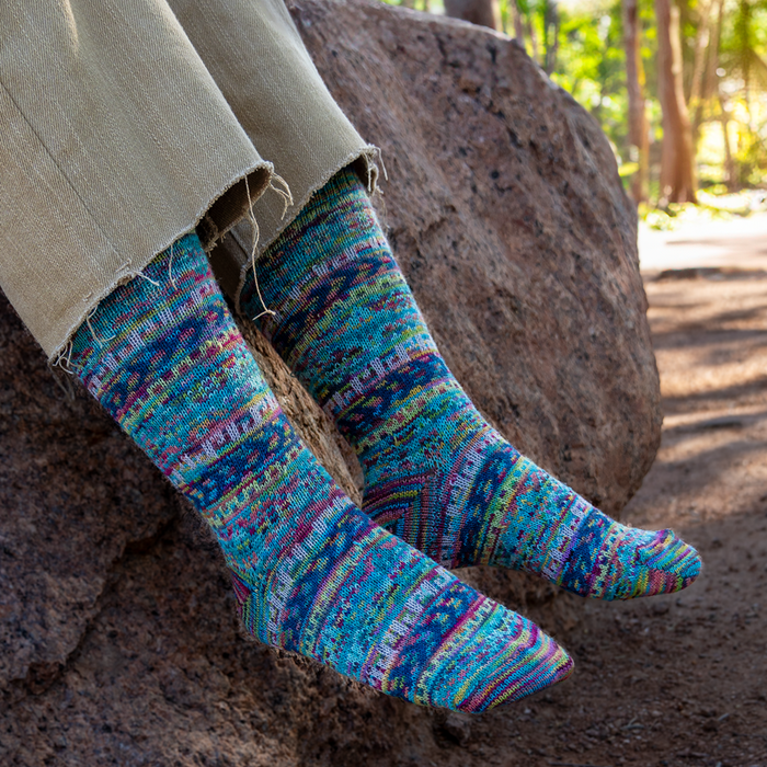 Knitted sock with a pattern on a beige background