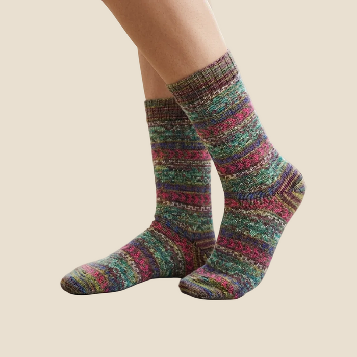 Colorful striped socks on a beige background