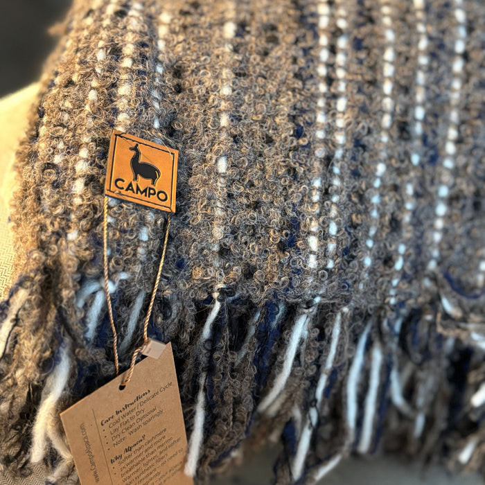 Textured fabric with a 'Camilo' brand tag