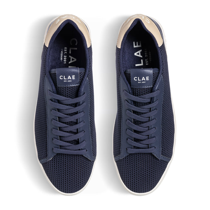 Three-quarter view of Bradley Knit shoe in Navy Safari, highlighting breathable knitted upper and modern classic design.