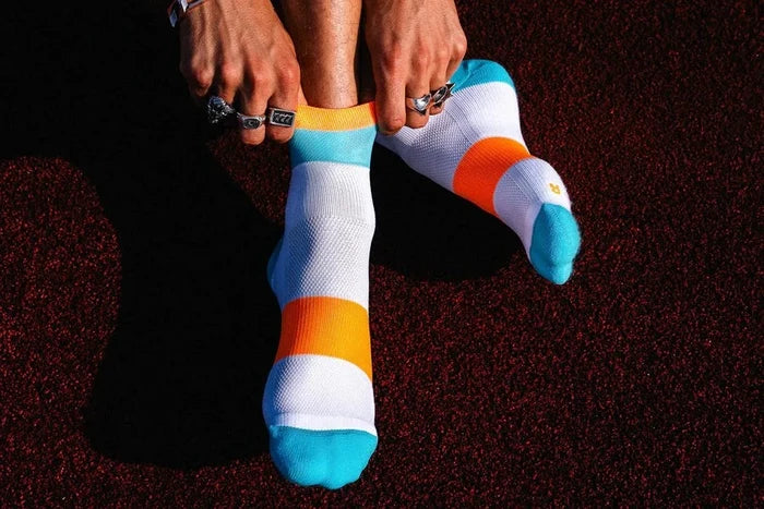 Incylence | Running Bands Short | Cyan / Orange