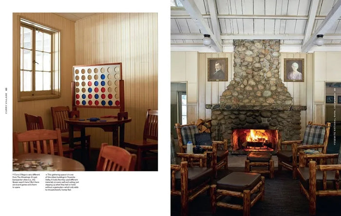 Lodge common area with rustic stone fireplace, wooden chairs, board games, and portraits