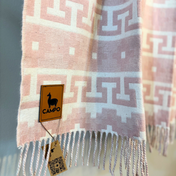 Blush pink patterned scarf with 'Campo' brand tag on a neutral background