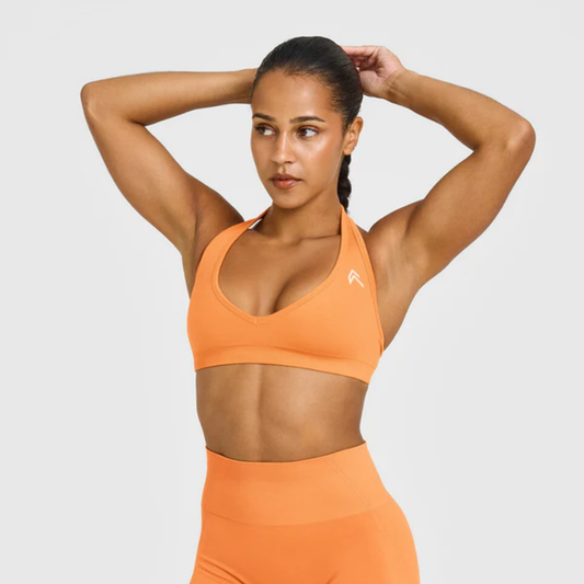 Oner Active - EffortlessLift Seamless Halter Neck Sports Bra with White Logo | Apricot Orange