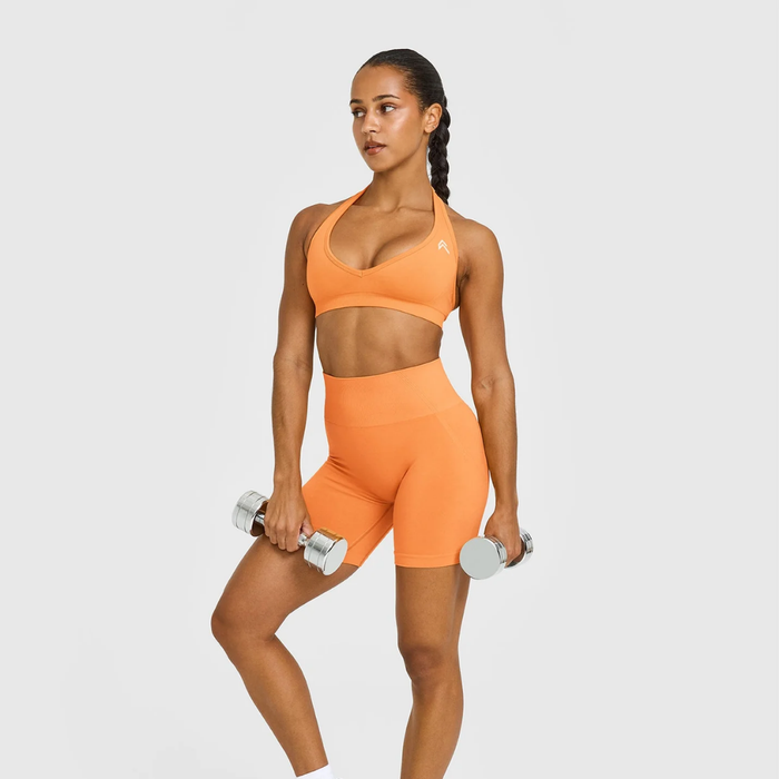 Oner Active - EffortlessLift Seamless Halter Neck Sports Bra with White Logo | Apricot Orange