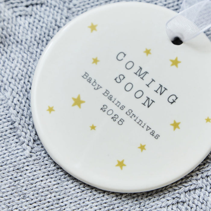 Personalised Coming Soon Round Ceramic Hanging Decoration